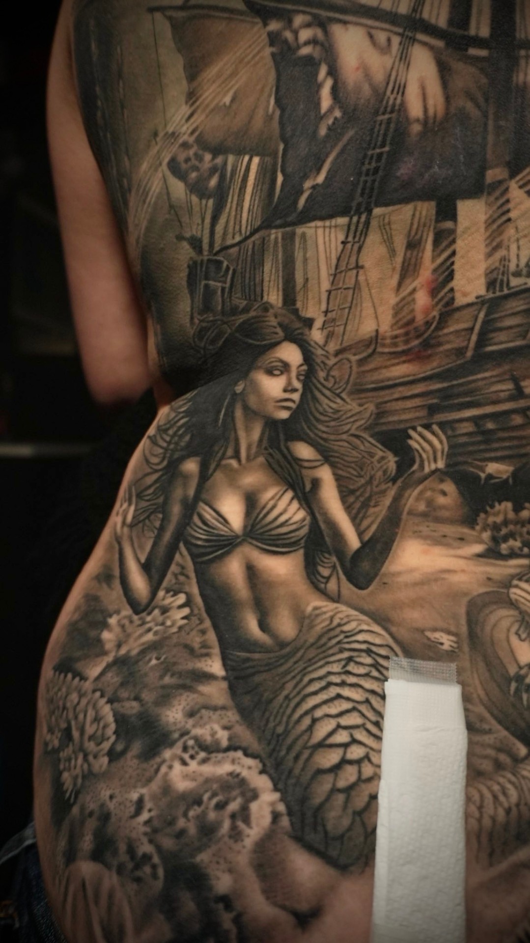 Black and grey realism mermaid detail tattoo